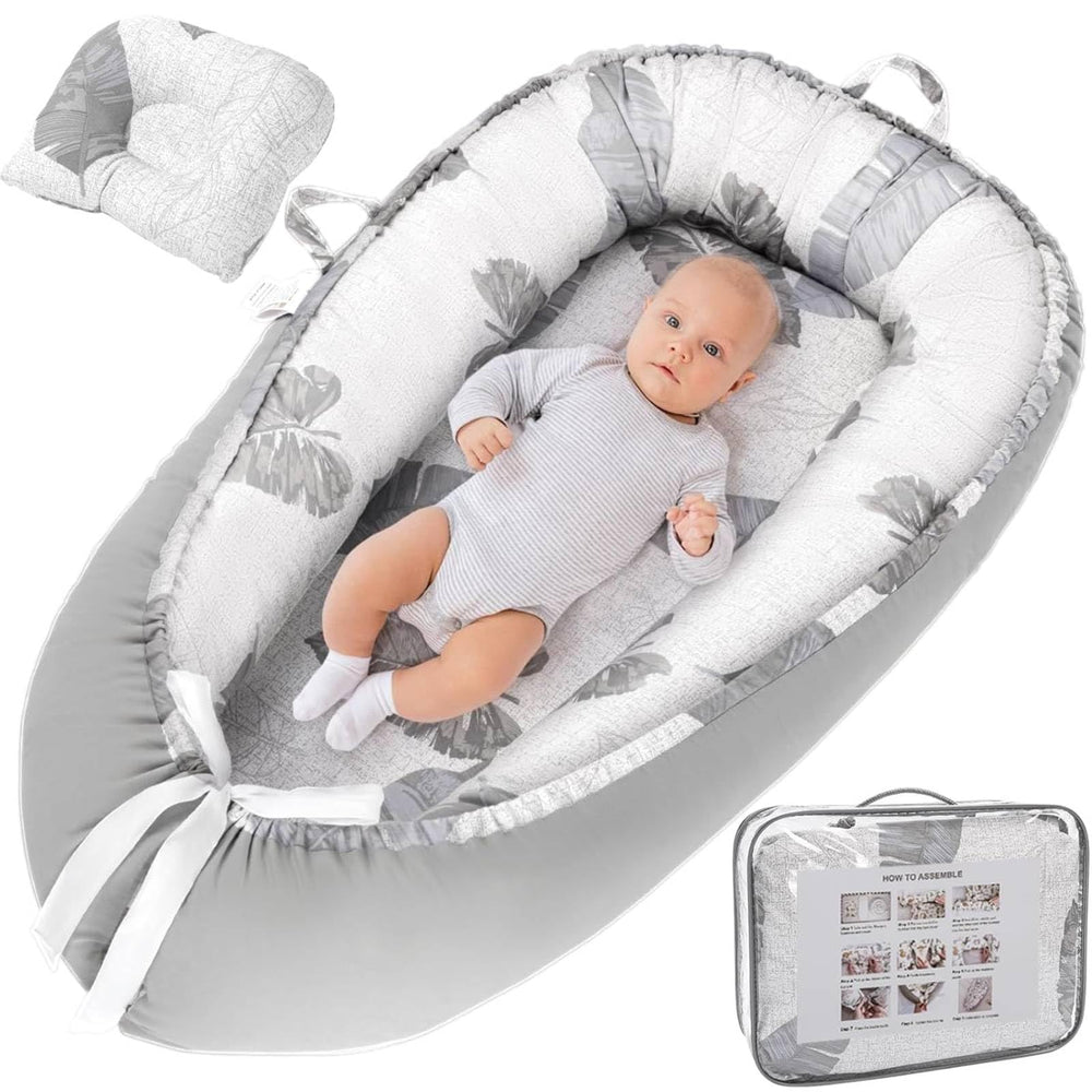Alened Baby Lounger Pillow close-up shows organic cotton cover for gentle skin contact and tummy time comfort.