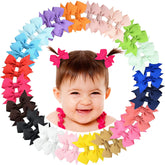 ALinmo 2-inch baby hair clip closeup showing secure bows for delicate hair.