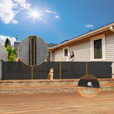 AMAZKRUS retractable gate fully extended across a wide doorway for child and pet safety