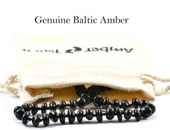 Amber Touch Baltic Amber Necklace Black closeup beads show natural warmth and craftsmanship