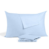Ambition Home youth pillowcase 16x22 light blue folded shows durable Egyptian cotton softness.
