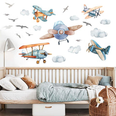 Amimagen airplane wall stickers brighten a baby room with playful aircraft decor.