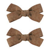 Amybasic adorable white hair bow clip for baby girls keeps hair neatly styled.