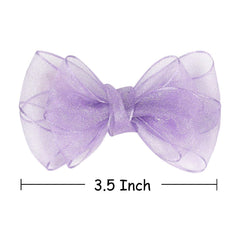Amybasic organza bow on toddler in purple complements outfits with subtle shimmer.