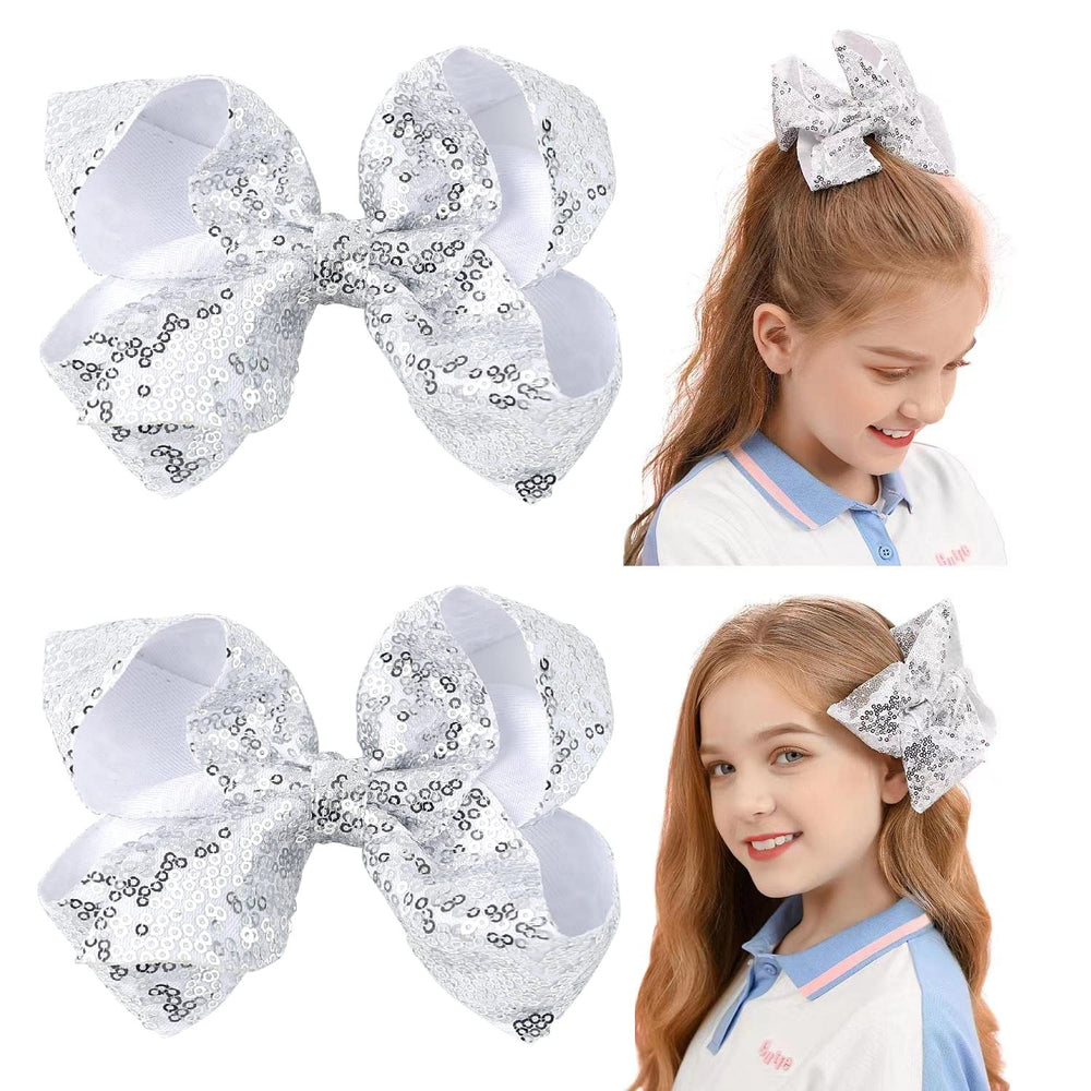 AMYDECOR 6inch silver glitter sequin hair bow with alligator clip for secure party-ready styling.