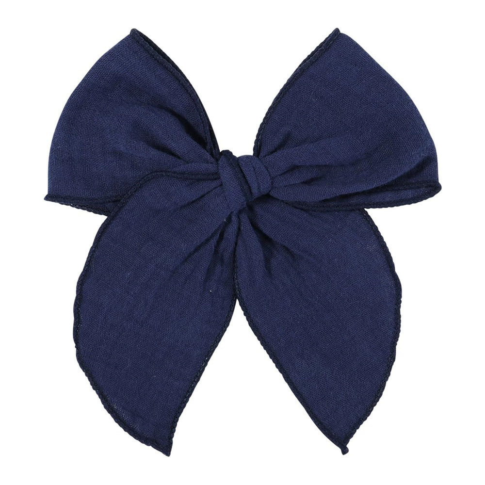 AMYDECOR navy blue Fable bow close-up showing soft linen cotton texture for gentle wear.