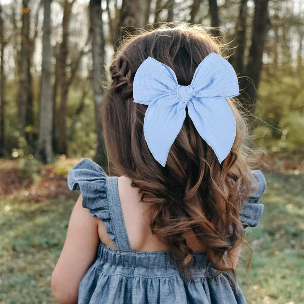 AMYDECOR sky blue fable bow side view with elegant edging for special occasions