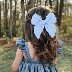 AMYDECOR sky blue fable bow side view with elegant edging for special occasions