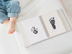 &And Per Se Baby Memory Book hidden double binding for durable lay-flat writing.