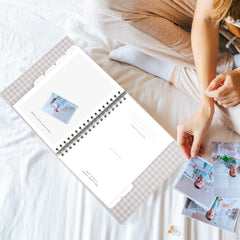 &And Per Se Baby Memory Book lay-flat design for easy journaling.
