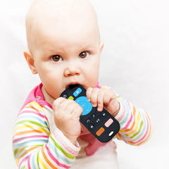 Anditoy teether child-hands image showing easy-grip size for toddlers.