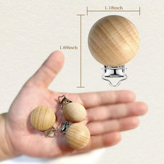 Anemeeoke beech wood pacifier suspender clip on-clothing angle highlights everyday use.