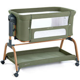 ANGELBLISS 3 in 1 Bassinet Green, fully assembled beside the bed for easy night-time access.