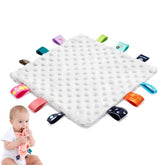 AnjeeIOT grey plush blanket closeup with colorful border tags for tactile exploration