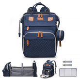 ANWTOTU diaper bag exterior showing sleek blue design for travel-ready organization