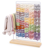 AOFLLU headband holder bow display keeps hair accessories neatly organized for quick styling.