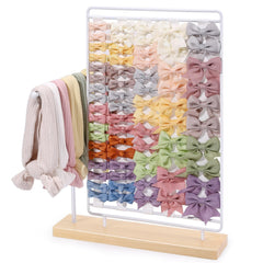 AOFLLU headband holder bow display keeps hair accessories neatly organized for quick styling.