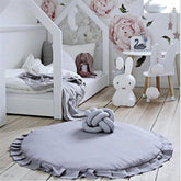 Apioiqa cotton-round-nursery-rug-ruffles-setup offers a soft baby play surface.