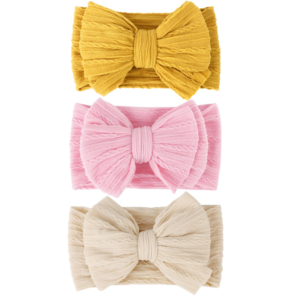 AQOKKA baby bows headbands bow design close-up highlights adorable outfit enhancement.