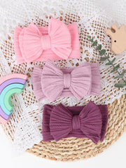 AQOKKA Headbands fit a wide range of tiny heads with gentle grip.