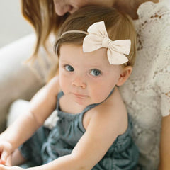 AQOKKA blue lattice headband provides secure stretch and cute detail.
