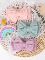 AQOKKA newborn bow headband ideal for photoshoots and family gatherings.