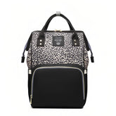 Armbq leopard diaper bag backpack front view highlights spacious, organized storage for baby essentials.