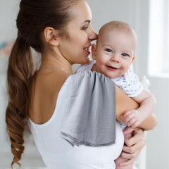 Arnzion muslin swaddle soft texture closeup emphasizes gentle, breathable weave for cozy moments