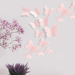 Artivo pastel pink butterflies, four sizes, easy-to-arrange for toddler room decor.