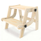Arwion toddler step stool folded for compact storage with a sturdy wooden finish.
