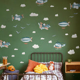 Astrkiz airplane wall decal 6.69x4.72 inches adds playful motion to a nursery.