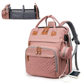 Astro alan diaper bag pink with changing station, ideal for quick diaper changes on outings.