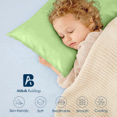 Two-pack sage green pillowcases offer soft, fade-resistant color for travel.
