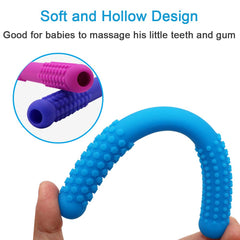 Atsky hollow-soft design teether massaging gums during teething.