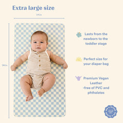 Ava + Oliver vegan leather changing mat Sky Checker wipe-clean surface for quick mess cleanup.