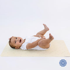 AVA + OLIVER changing mat open palm trees design for at-home or on-the-go use.