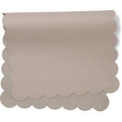 AVA + OLIVER vegan leather changing mat in grey scallop, open for diaper changes on the go.