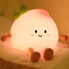 AVEKI Peach Night Light face: cute smile for calm bedtimes and safe night checks.