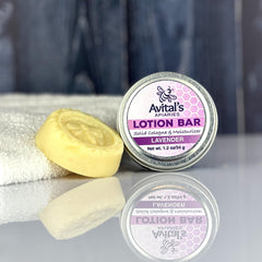 Avital's Apiaries lavender beeswax lotion bar closeup showing nourishing shea and argan oils.