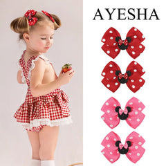 Ayesha mouse ears bow clip on girl head demonstrates a cute everyday accessory.
