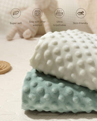 Babebay Roman Green cover on a pad highlights soft texture for comfortable diaper changes.