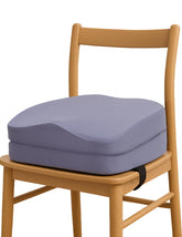 Babelio two-in-one Ergo booster seat on chair supports proper posture during meals.