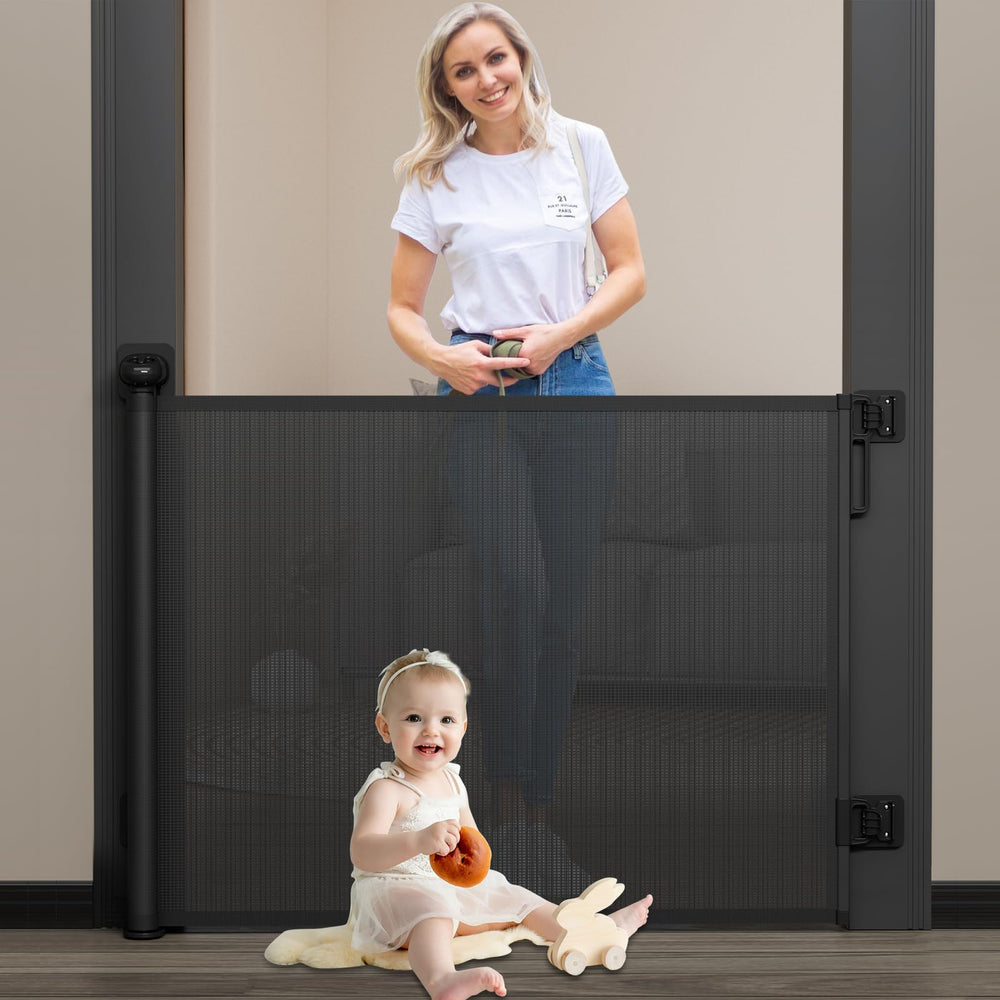 Babepai retractable baby gate on stairs demonstrates space-saving safety.