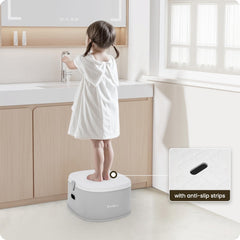 Babilous potty trainer seat with adjustable lever for standard toilets.