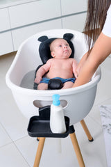 Babu Bath 3-stage convertible design shown with newborn insert and toddler mode