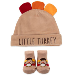 Baby Essentials Little Turkey hat offers cozy warmth for Thanksgiving photo moments.