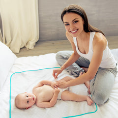 BABY LOOVI diaper changing mat open displaying large 80x60 cm workspace.