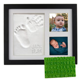 Baby Mushroom handprint close-up in a black wood frame for a nursery keepsake.