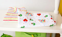 Baby Starters cotton muslin breathable swaddle blanket highlights lightweight warmth and easy care.