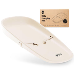 Baby Uma wipeable changing pad on dresser showing waterproof surface for quick cleanup